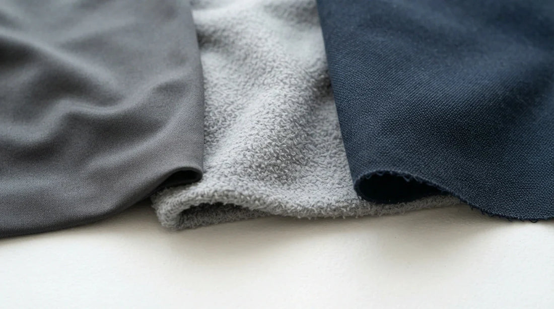 Assorted polyester fabrics showing different textures on white surface.