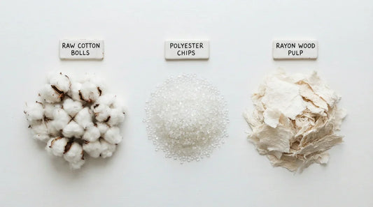 Three raw fibers cotton polyester rayon used in tri-blend fabric.